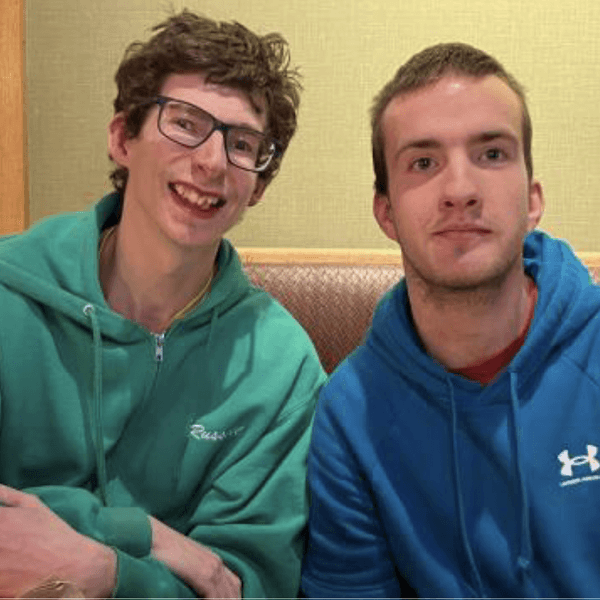 Two athletic special young men who have grown up together
